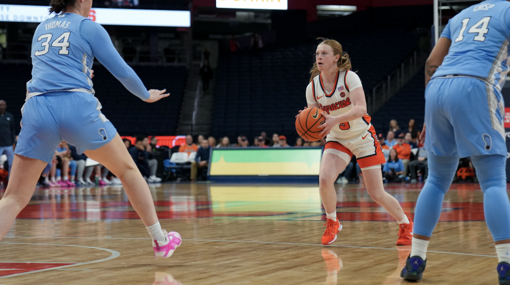 Freshman Olivia Schmitt going up for a three-pointer against North Carolinas defense. 